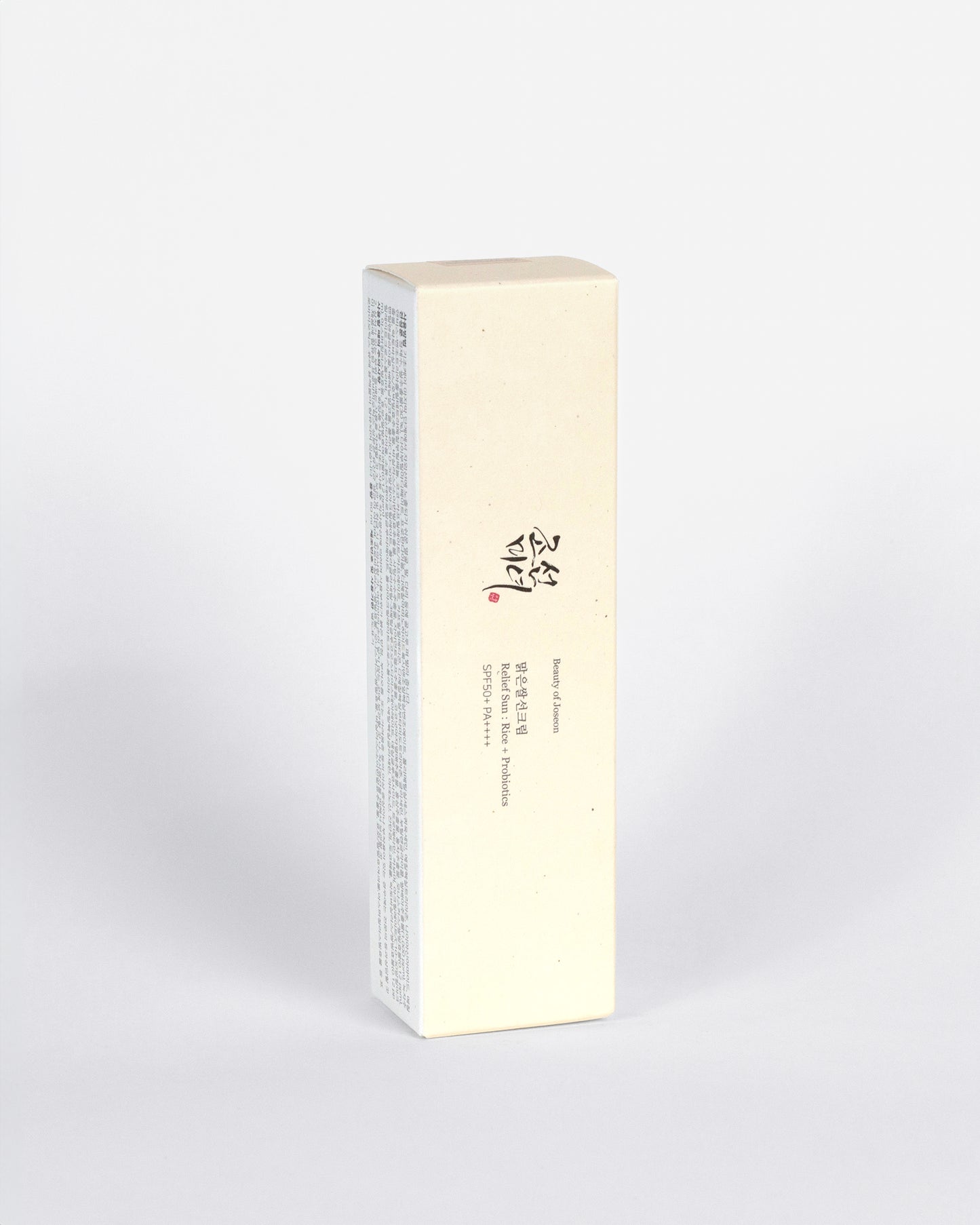 Empaque de Beauty of Joseon Relief Sun: Rice + Probiotics – Tubo minimalista con fórmula nutritiva y protección solar de amplio espectro para uso diario.
