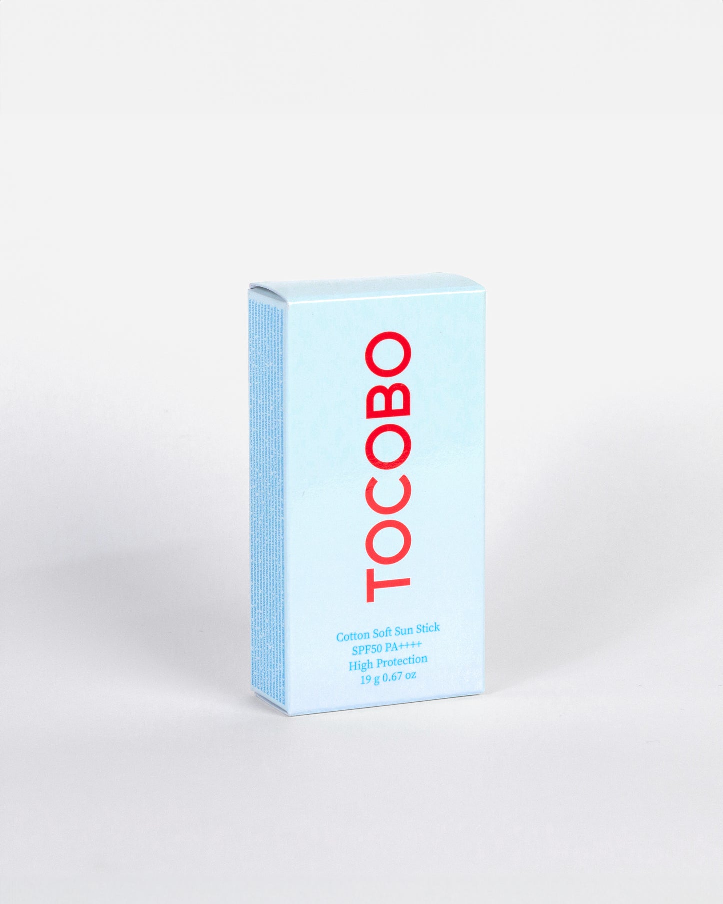 Empaque de Tocobo Cotton Soft Sun Stick – Barra compacta con diseño minimalista y protección solar SPF50+ PA++++ contra rayos UVA y UVB.